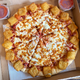 Illustration for article titled Pizza Hut’s Mozzarella Poppers Pizza should fry harder next time